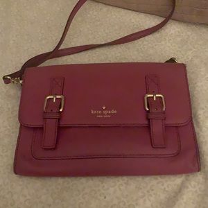 Kate spade sling bag in a berry color